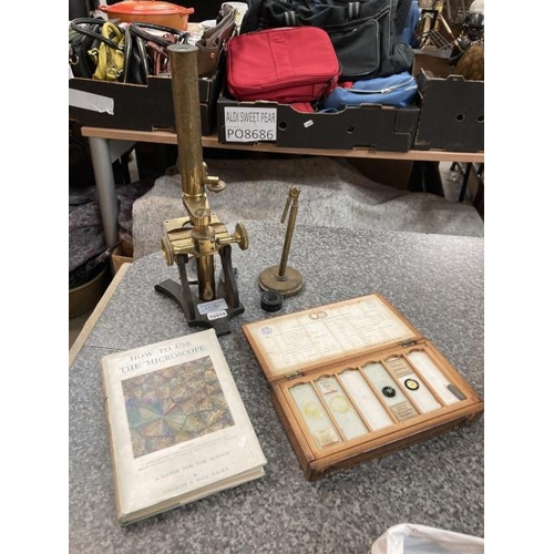 294 - Brass microscope with glass slides & G.A. Hall microscope book