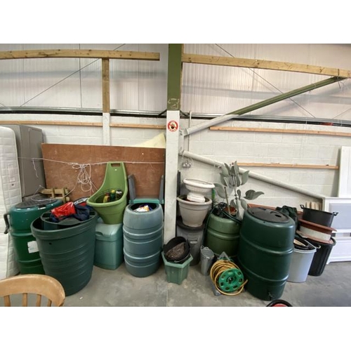 4 - Quantity of assorted water butts, planters, hose pipes etc