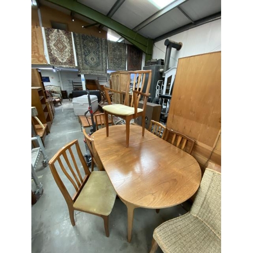 94 - Mid century teak extending dining table 76H 153W 95D and 6 chairs including 2 carvers