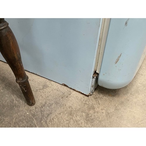 223 - Blue SMEG fridge freezer 170H 60W 70D (some rusting to bottom sides)