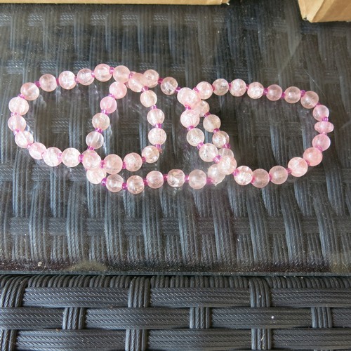 488 - 3 boxes of approximately 369 pink bracelets