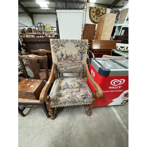 119 - Oak framed carver chair with tapestry upholstery 65W