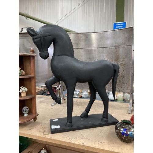 476 - Black treen carved horse 51cm H