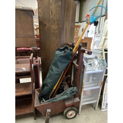 84 - Assorted garden tool, chairs and a wooden barrow