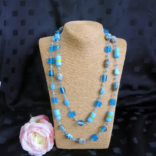 456 - Approx. 66 long beaded necklaces in blue (Brand new)