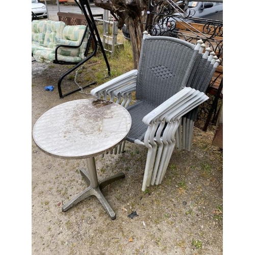 256 - 6 stacking garden chairs 56W and a bistro table 73H 60cm diam