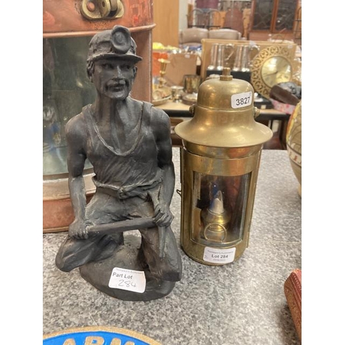 284 - Miner sculpture and a miner's style lamp