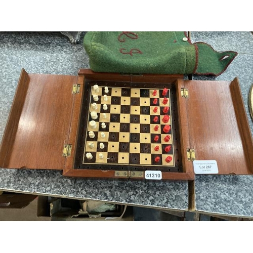 287 - Mahogany cased travel chess board & pieces