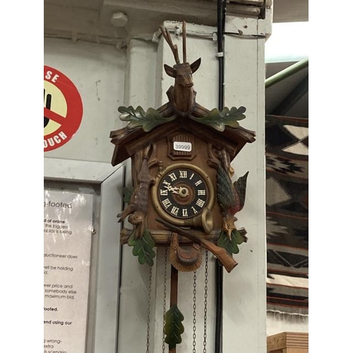 295 - Vintage cuckoo clock with chains, pendulum & 2 weights