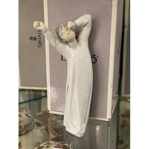 437 - Boxed Lladro boy yawning figurine