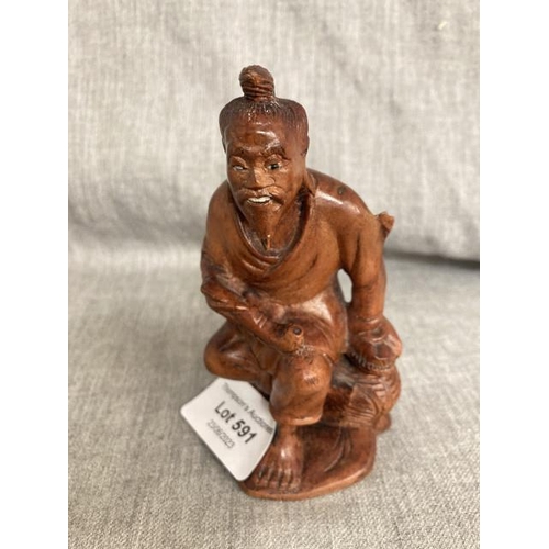 591 - Carved Chinese hardwood figurine, circa 1800