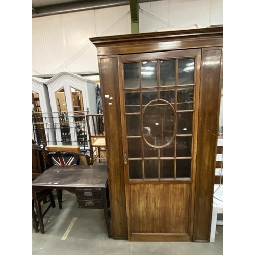 90 - 1950’s oak desk 70H 91W 49D and a Victorian mahogany glazed wardrobe 210H 107W 48D