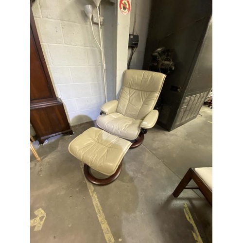 120 - Cream leather Ekornes swivel recling chair and footstool