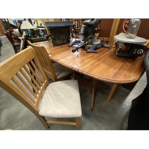 193 - Pine extending table 77YH, 155W, 100D and 4 beech chairs