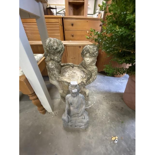 209 - Resin Buddha and a stone effect garden birdbath