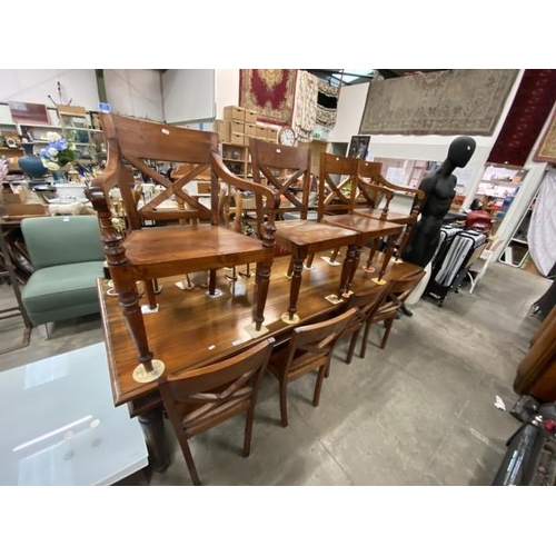 217 - Contemporary hardwood dining table ( 12” scratch to top) 77H 250W 97D and 8 chairs including 2 carve... 