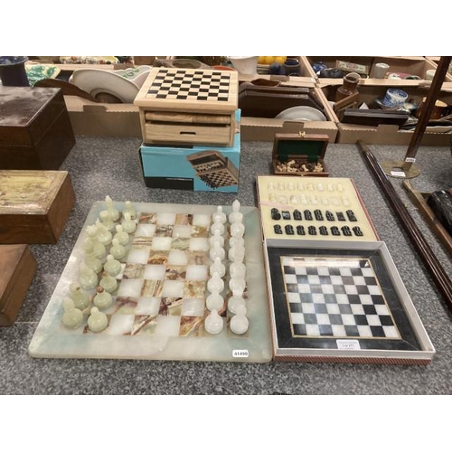 271 - Boxed games compendium, 2 onyx & marble chessboard & pieces & fruitwood travel chess set