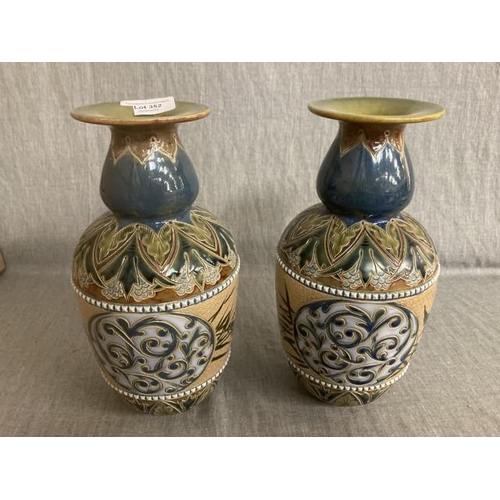 352 - Pair of Doulton Lambeth vases, decorated by Florence Barlow 25cm high