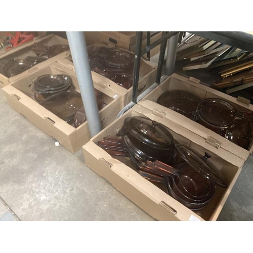 562 - 5 boxes of brown glass Pyrex cookware's