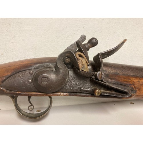 324 - Tower British Flintlock Blunderbuss with an iron barrel. The lock engraved 