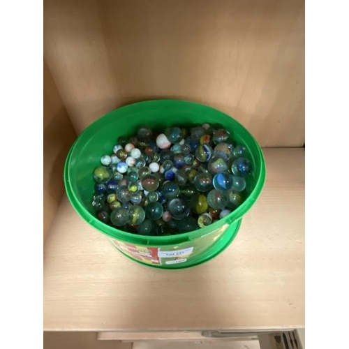 231 - Tub of marbles inc. onion swirls