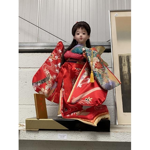 344 - Figurine of a Geisha (56cm tall)