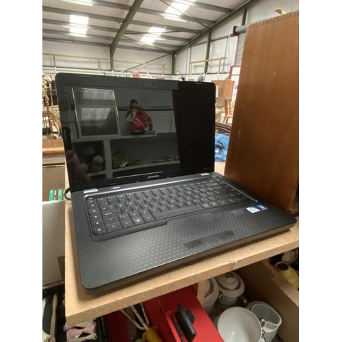 421 - Compaq Windows 7 laptop with charger