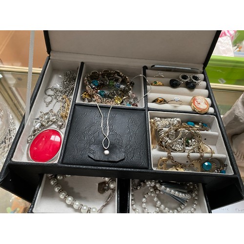 397 - Jewellery box and contents to include, rings, necklaces, bracelets etc