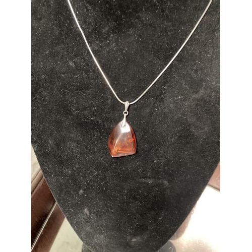 458 - Silver amber pendant on silver chain