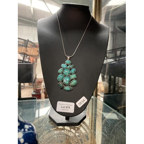 479 - Turquoise set pendant on silver chain