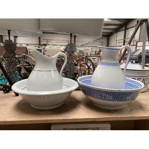 511 - White with gilt decoration wash jug and bowl and a blue and white wash jug and bowl