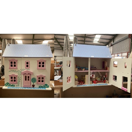 513 - Child’s doll house with assorted furniture 60H 60W 30D