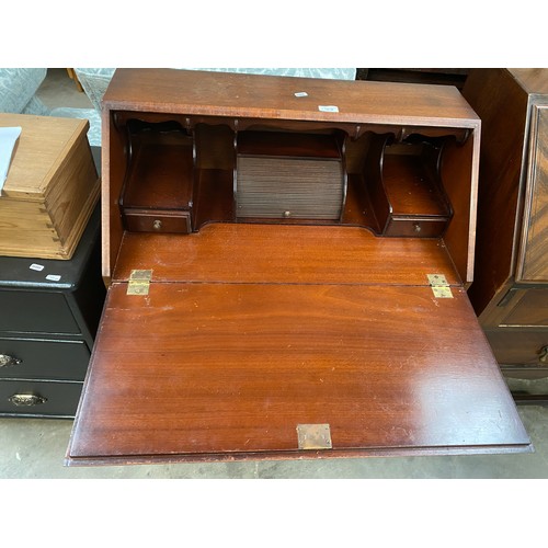 36 - 2 Edwardian mahogany bureaux 104H 91W 47D & 90H 75W 45D