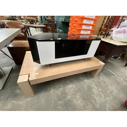 112 - Modern black and white media stand 42H 111W 41D and a Natuzzi Italia light oak coffee table 37H 140W... 