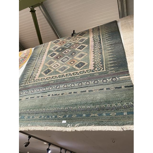 153 - Green ground rug 160 x 235cm