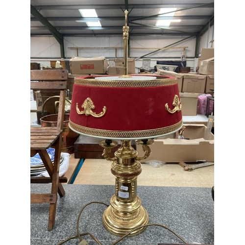 208 - Gilt 3 branch table lamp with red shade (53cm tall)