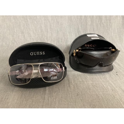 258 - Cased Gucci sunglasses (GG 3035/S REMCZ 105/) & Cased Guess sunglasses (GU 6623 SI-35F)