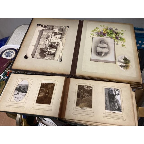 265 - 2 Victorian brass clasped photograph albums containing early black & white family photographs (large... 