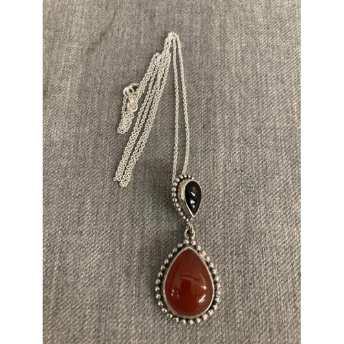 273 - Silver red stone & marcasite pendant on a silver chain