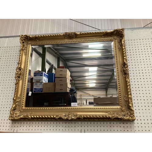 352 - Carved gilt framed bevel edged mirror 60x75cm