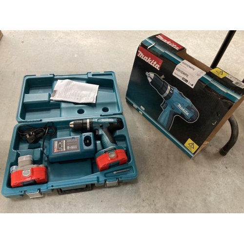 426 - Makita 8391D cordless hammer driver drill with charger and spare battery (new)