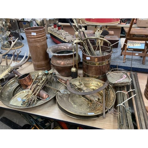 449 - Collection of brass & copper items, including stair rods, chargers, planter, trivit, fire irons etc