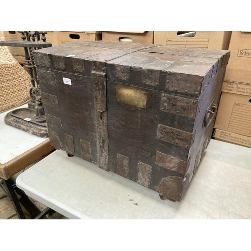 456 - Iron reinforced wooden chest on wheels with brass nameplate 