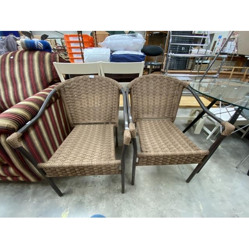 93 - Pair of rush seated garden chairs 59W