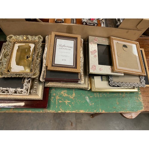 486 - Assorted collectibles including glassware, tankards, brass mirror, photo frames etc