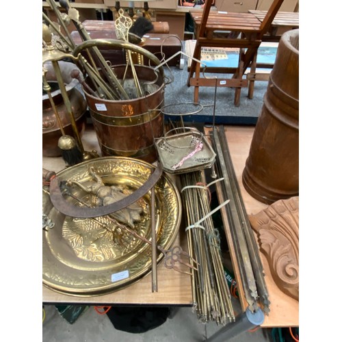 449 - Collection of brass & copper items, including stair rods, chargers, planter, trivit, fire irons etc