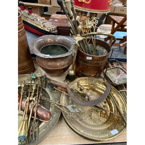 449 - Collection of brass & copper items, including stair rods, chargers, planter, trivit, fire irons etc