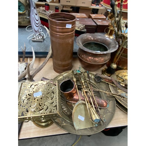 449 - Collection of brass & copper items, including stair rods, chargers, planter, trivit, fire irons etc