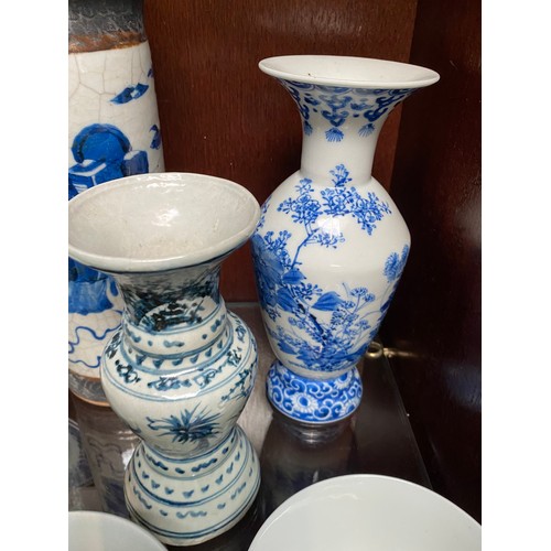 362 - 2 shelves of oriental ceramics inc. Japanese vase, blue & white Chinese plates etc. (some pieces rep... 