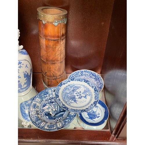 362 - 2 shelves of oriental ceramics inc. Japanese vase, blue & white Chinese plates etc. (some pieces rep... 